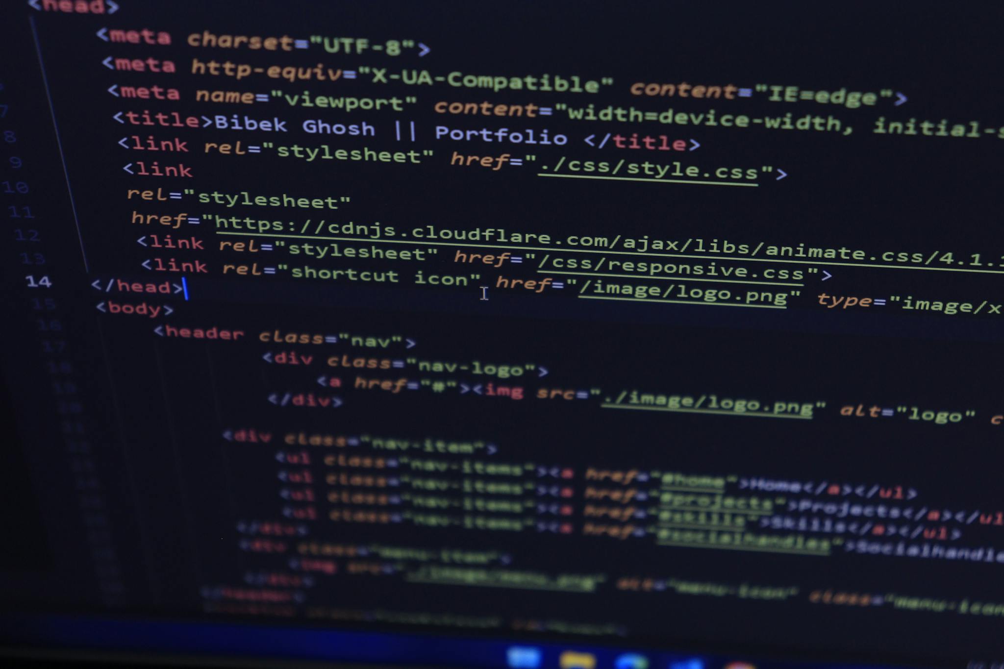 Close-up of HTML and CSS code displayed on a computer screen, ideal for tech and programming themes.